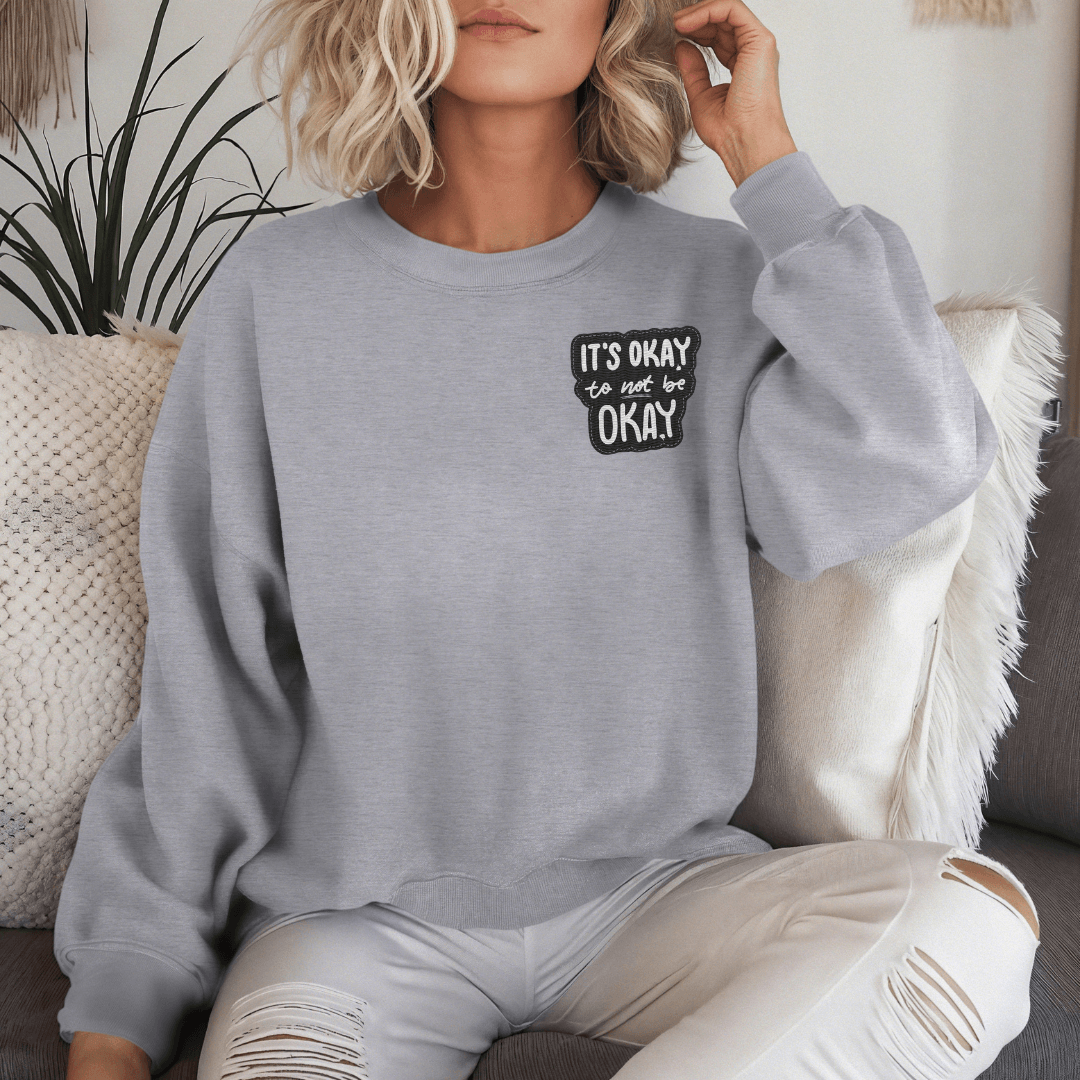 It's Okay to not be Okay - Unisex Sweatshirt (with Left Chest and Wrist Embroidery)